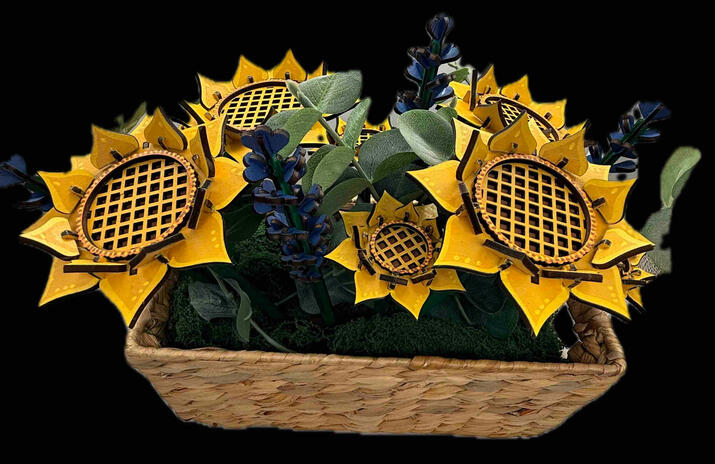 Beautiful hand painted sunflowers arrange in a basket